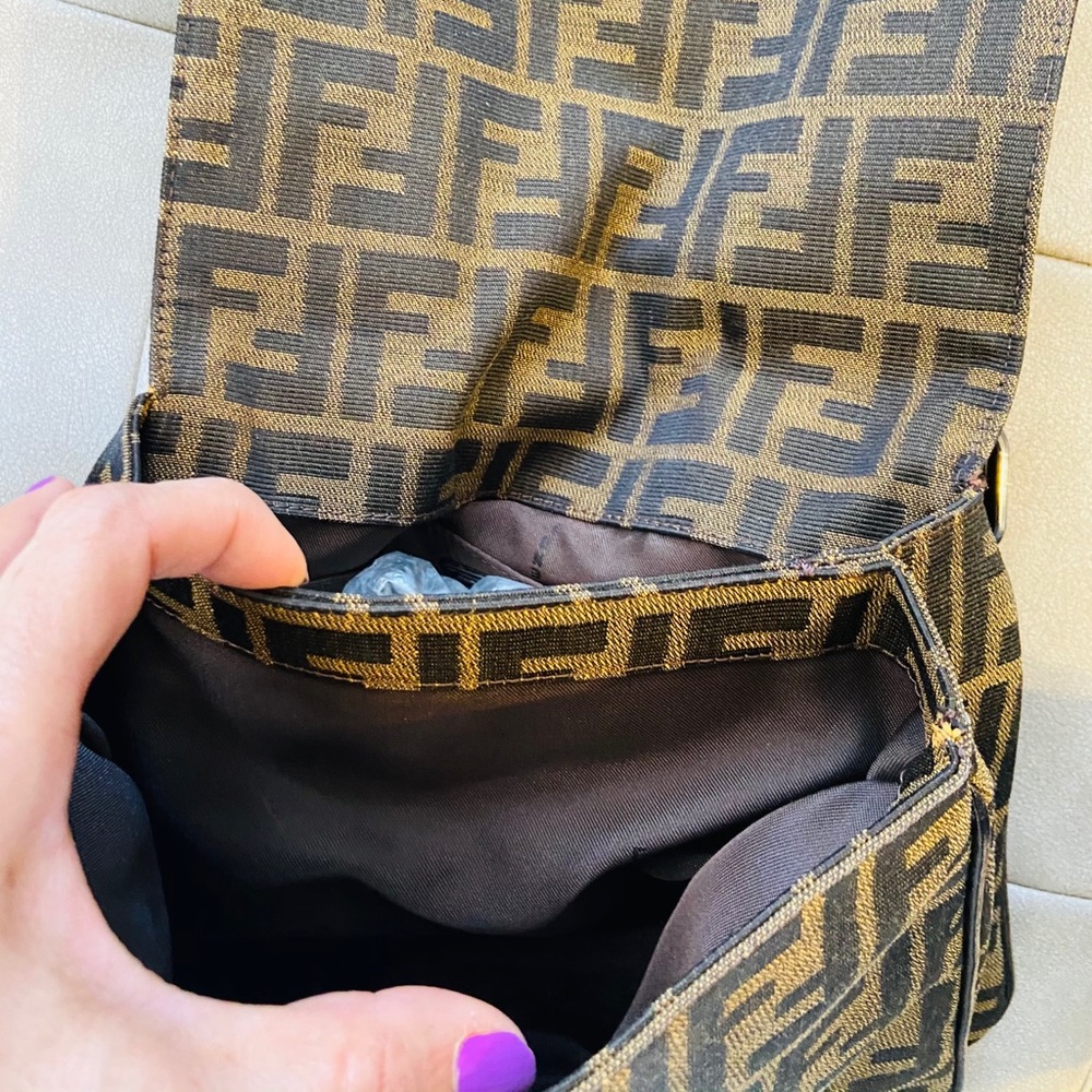 Vintage Fendi Monogram Signature logo.